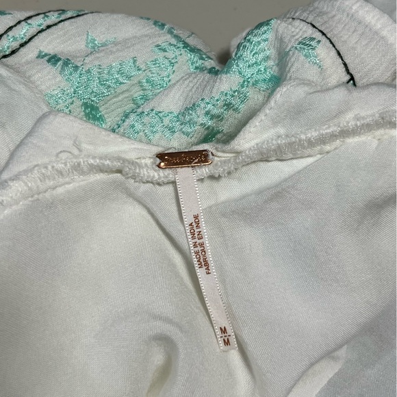 FREE PEOPLE Rhiannon Embroidered Tie Back Babydoll Mini Dress - Picture 10 of 15